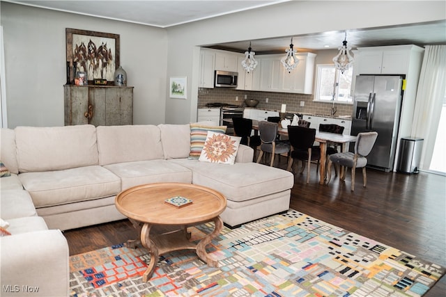 living room with dark wood-style flooring