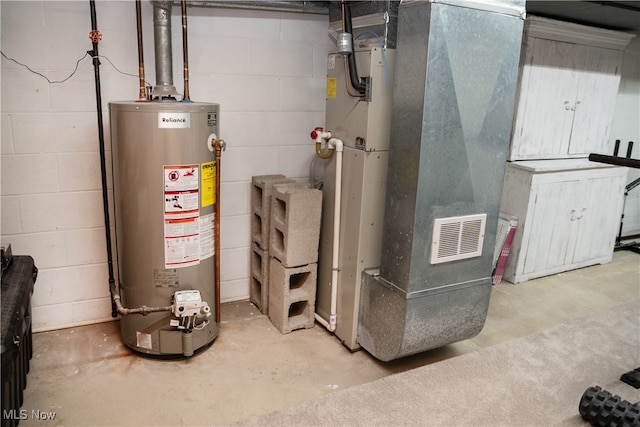 utilities featuring water heater and heating unit