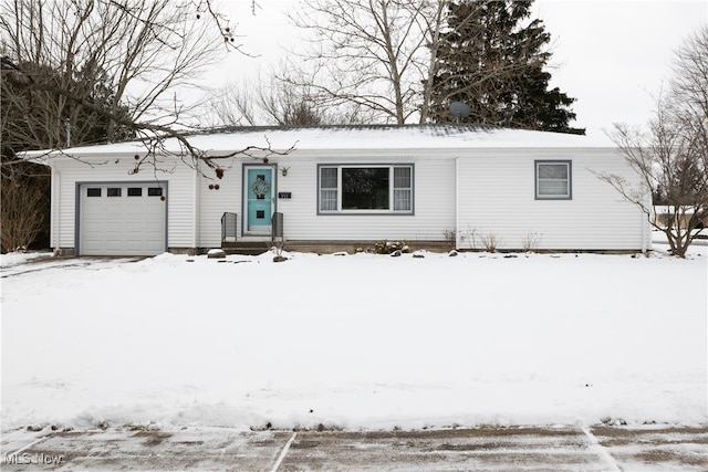 single story home featuring a garage