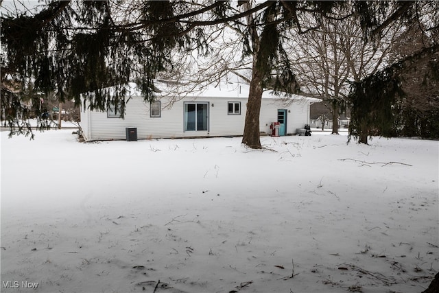 view of snow covered property