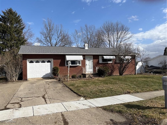 single story home featuring an attached garage, a front lawn, concrete driveway, and brick siding