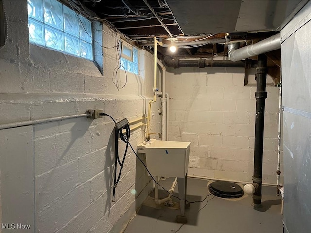 basement featuring a sink