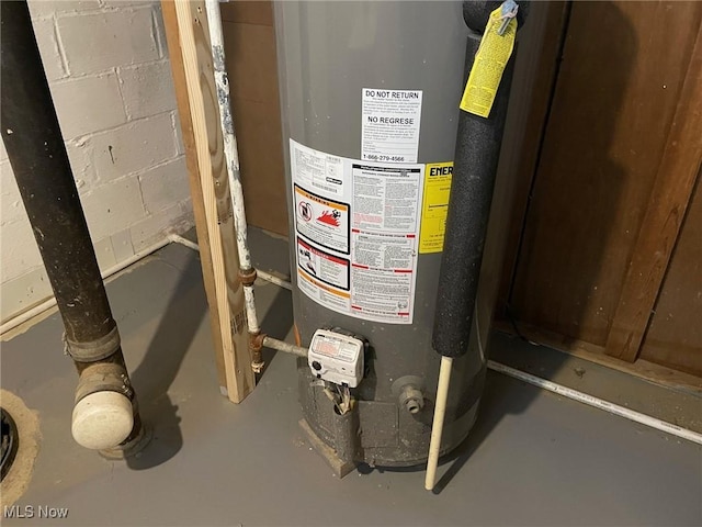 utility room with water heater