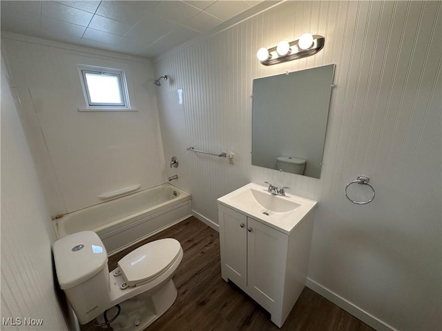 bathroom with shower / tub combination, vanity, toilet, and wood finished floors