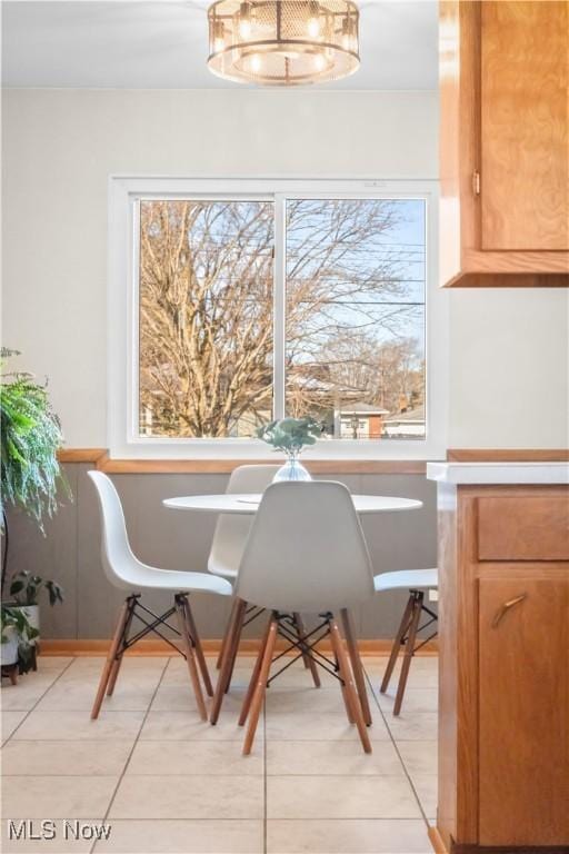 dining room with light tile patterned floors