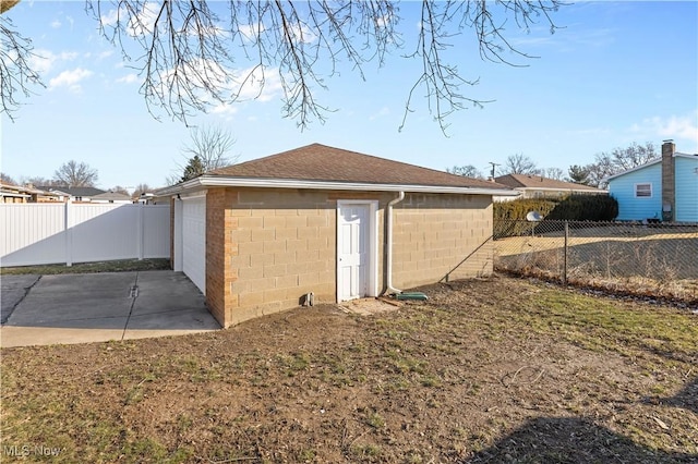 garage featuring fence