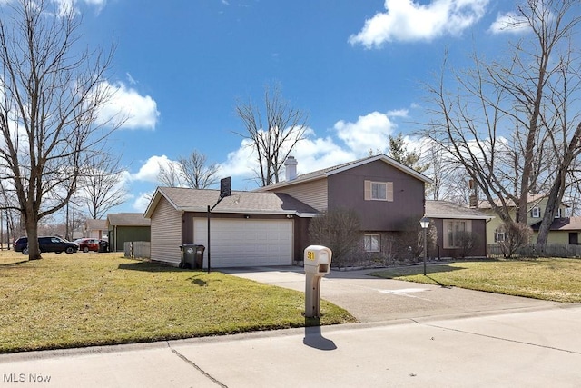 view of front of house featuring driveway, an attached garage, a chimney, and a front lawn