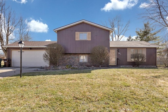 tri-level home featuring driveway, brick siding, an attached garage, and a front yard