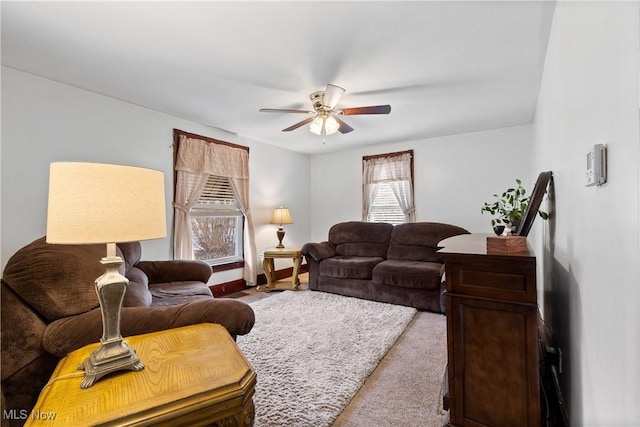 living room with a ceiling fan