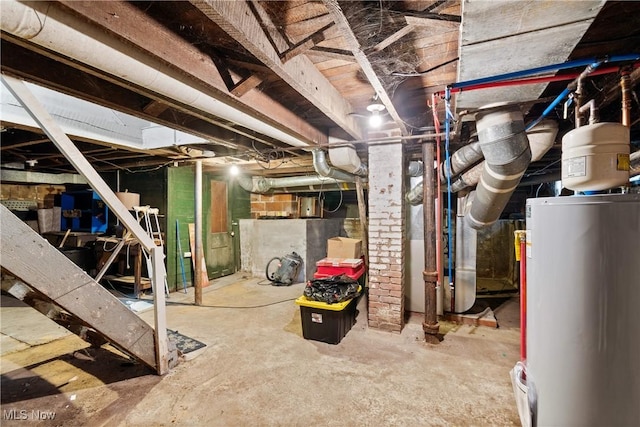 unfinished basement featuring water heater