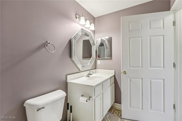 half bath with toilet and vanity