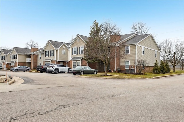 view of front of home with a residential view