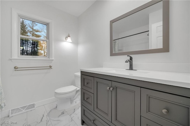 full bath featuring toilet, vanity, visible vents, baseboards, and marble finish floor