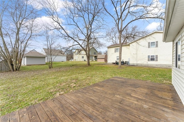 deck featuring a yard