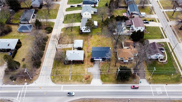 birds eye view of property with a residential view