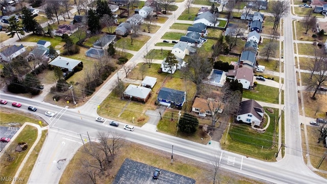 birds eye view of property with a residential view