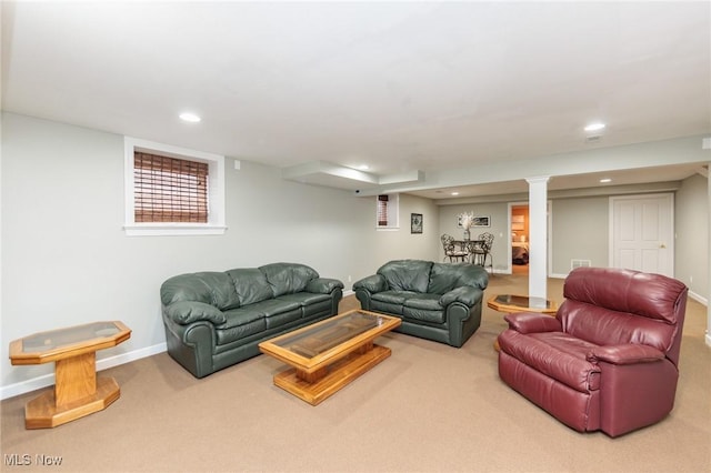 carpeted living area featuring baseboards and recessed lighting