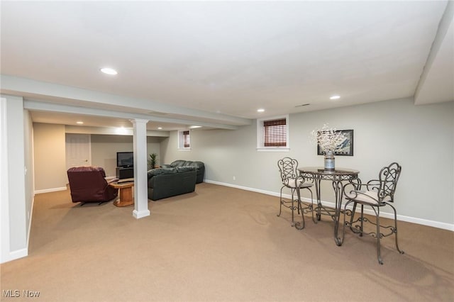 carpeted dining space with baseboards and recessed lighting