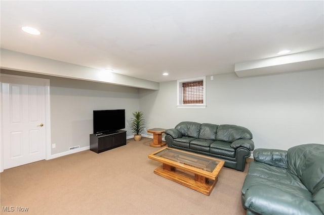 living room with baseboards, carpet, and recessed lighting