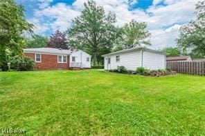 view of yard featuring fence