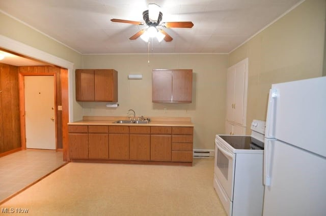 kitchen with white appliances, brown cabinets, light countertops, light floors, and a sink