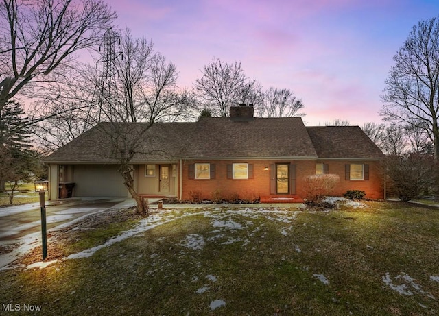 single story home featuring concrete driveway, brick siding, a chimney, and roof with shingles