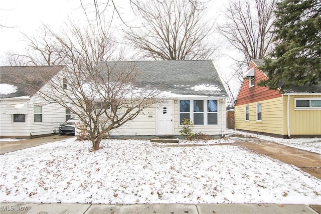 view of front of house featuring a shingled roof