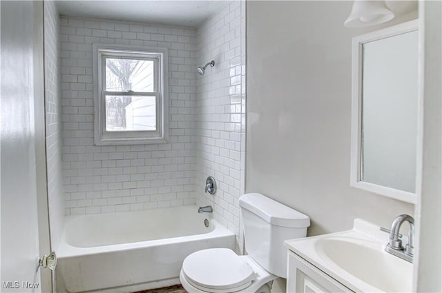 full bathroom with shower / washtub combination, vanity, and toilet