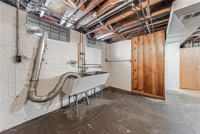 unfinished basement with a sink