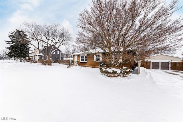 view of front of home with fence