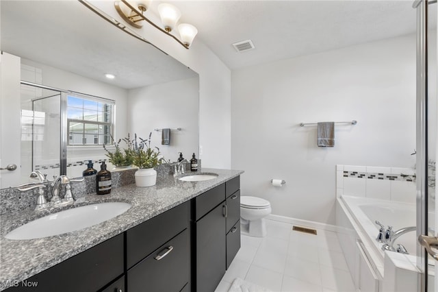 full bath with a bath, visible vents, toilet, and a sink