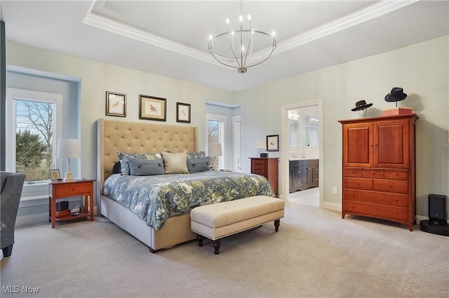 bedroom featuring baseboards, a tray ceiling, an inviting chandelier, and light colored carpet