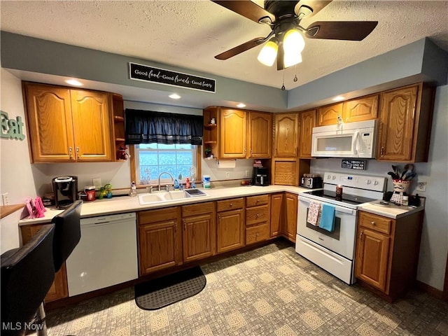 kitchen featuring open shelves, white appliances, brown cabinetry, and a sink