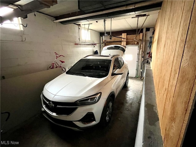 garage featuring concrete block wall