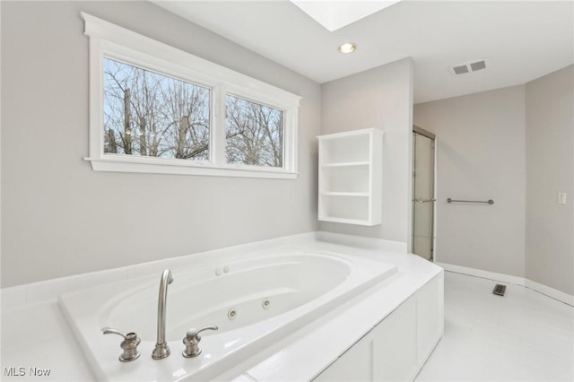 full bathroom with recessed lighting, a skylight, visible vents, a tub with jets, and an enclosed shower