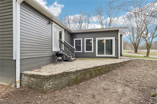 rear view of property with a patio