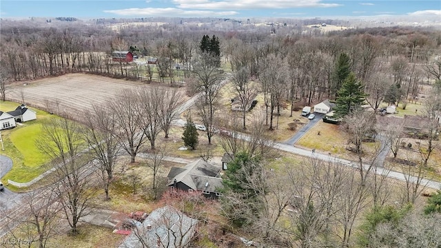 drone / aerial view with a view of trees