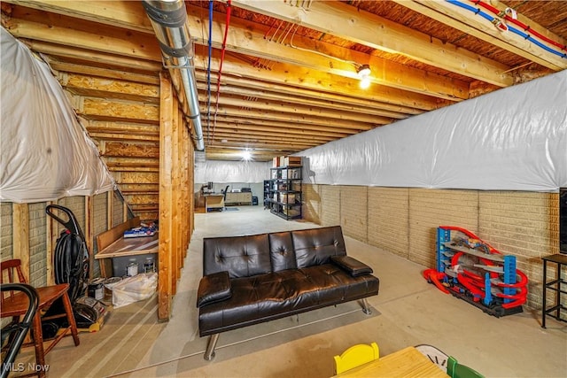 unfinished basement with brick wall