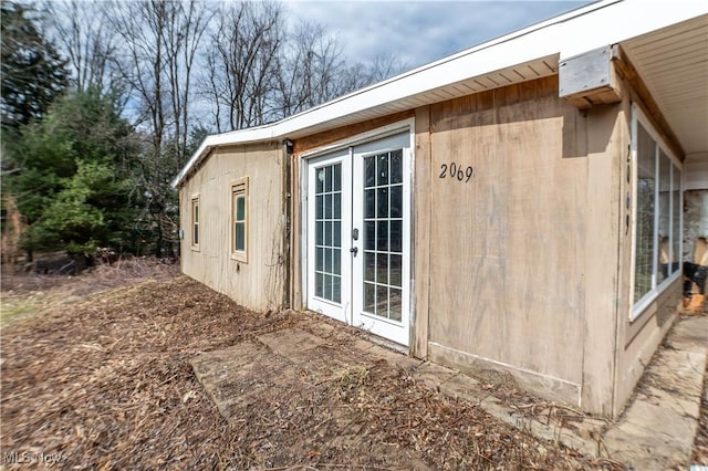 view of home's exterior featuring french doors