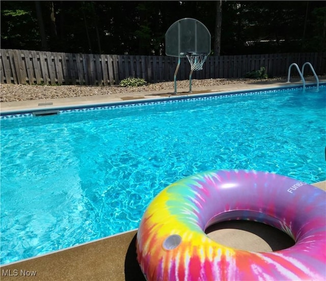 view of pool featuring fence and a fenced in pool