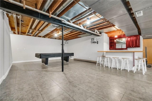 unfinished below grade area with visible vents, baseboards, and pool table