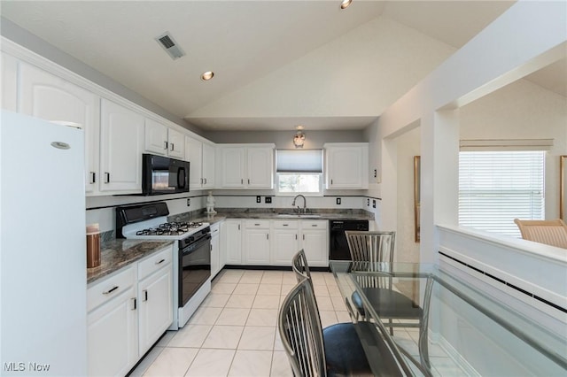 kitchen featuring light tile patterned floors, a sink, visible vents, white cabinetry, and black appliances