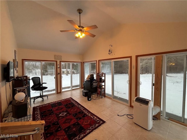 interior space with ceiling fan and vaulted ceiling