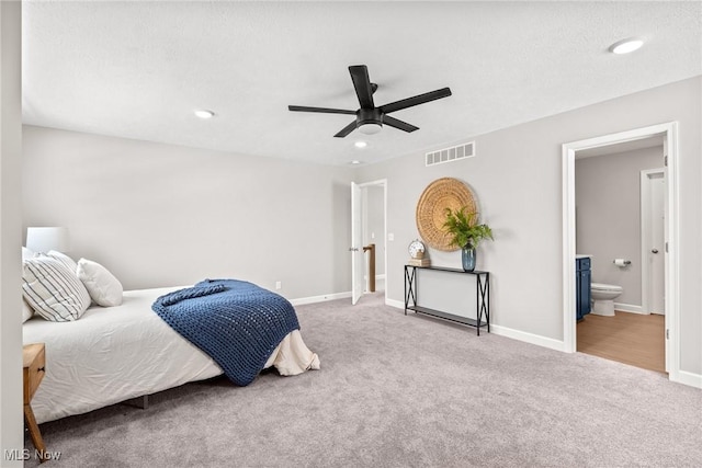 carpeted bedroom featuring baseboards, visible vents, a ceiling fan, and recessed lighting