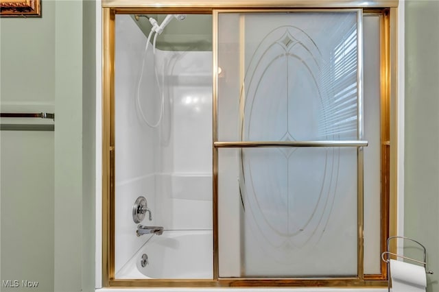 bathroom featuring enclosed tub / shower combo