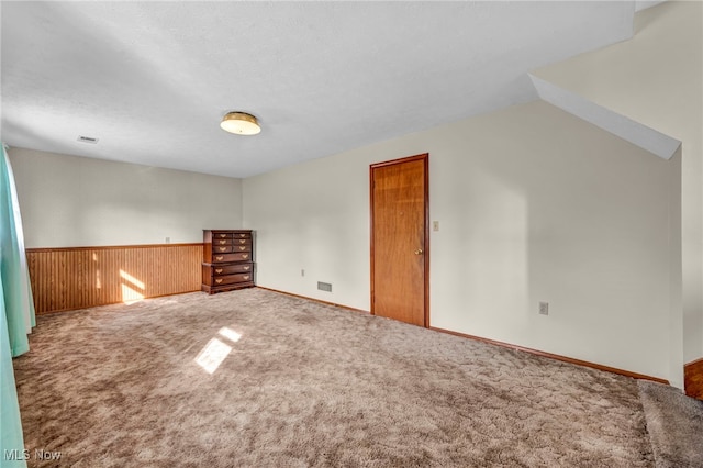 bonus room with carpet and visible vents