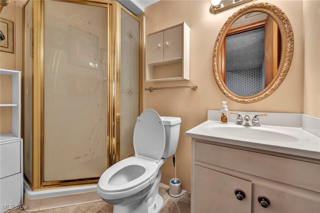 bathroom featuring a stall shower, tile patterned flooring, vanity, and toilet