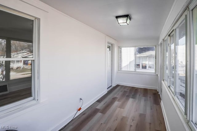 view of unfurnished sunroom