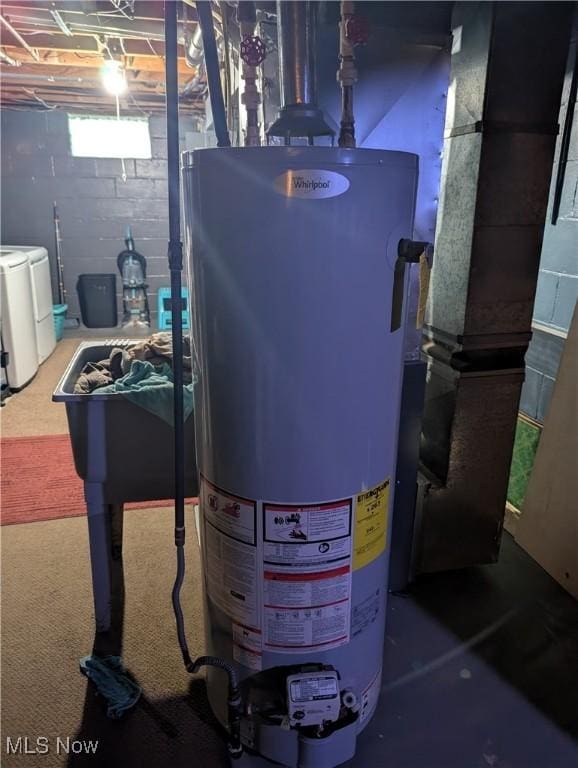 utilities with water heater and washer and dryer