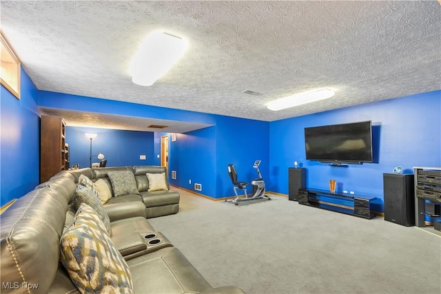 carpeted living room featuring baseboards and a textured ceiling